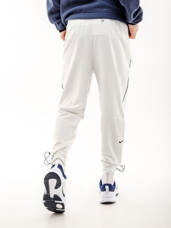 Штани Nike TRACK CLUB PANT