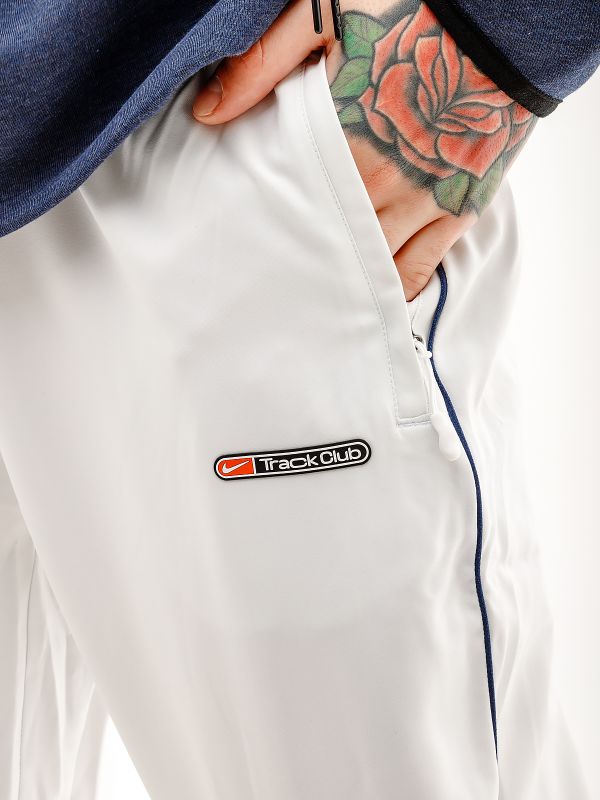 Штани Nike TRACK CLUB PANT